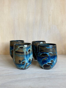 Floating blue multipurpose cup