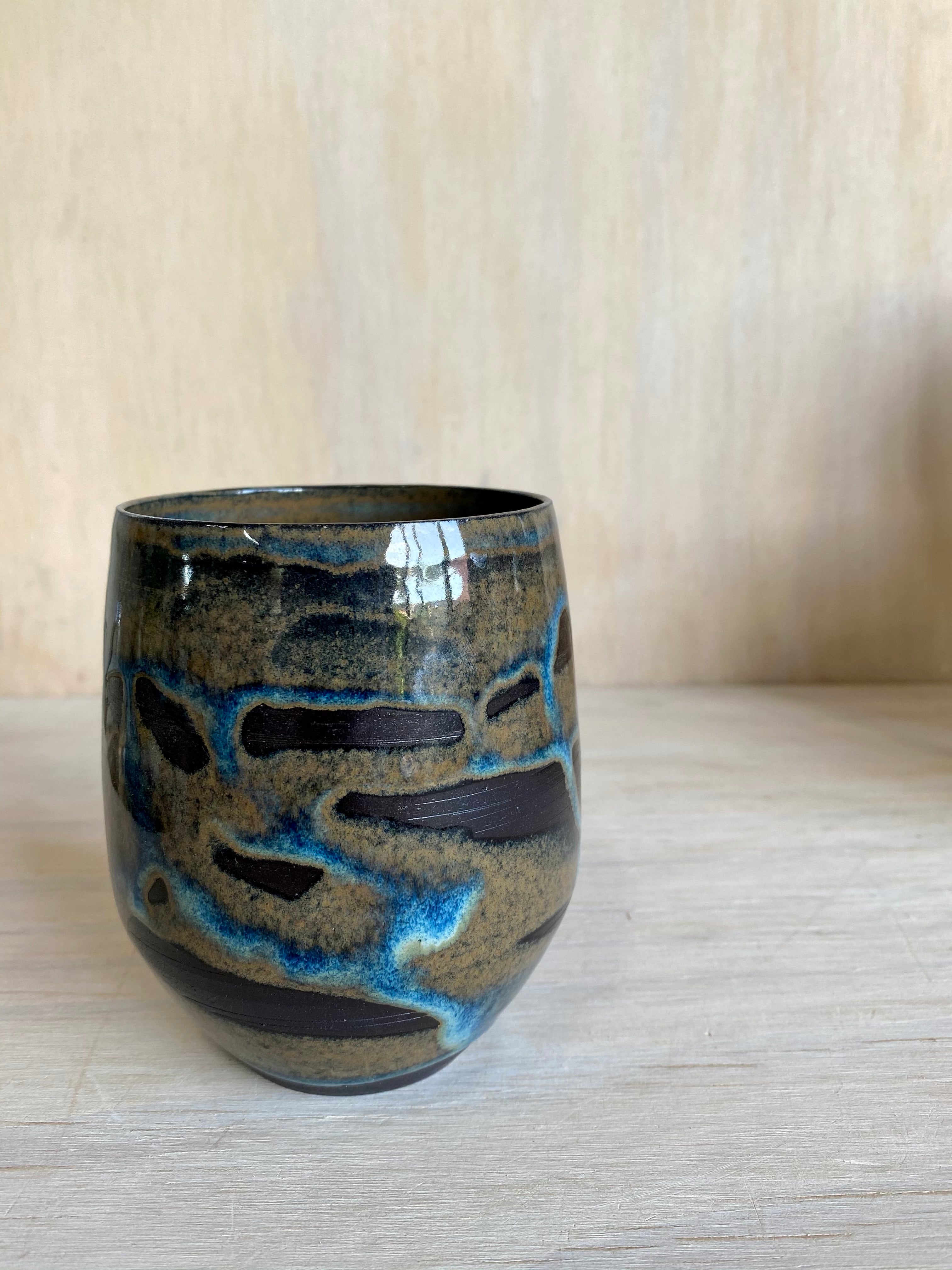 Floating blue multipurpose cup