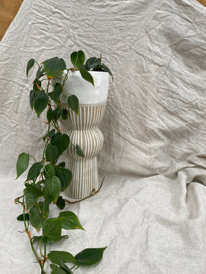 White textured raised sculptural planter
