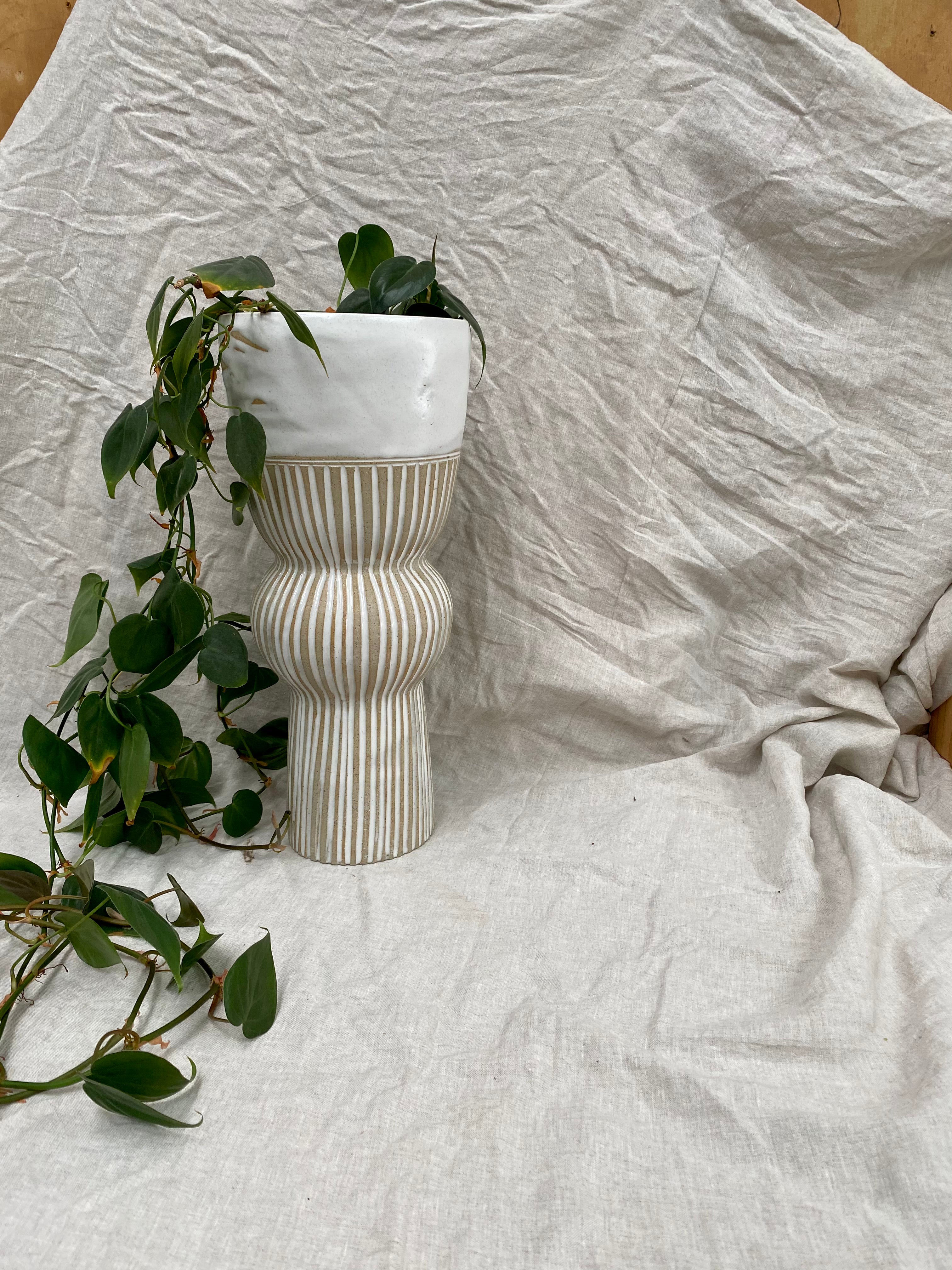 White textured raised sculptural planter